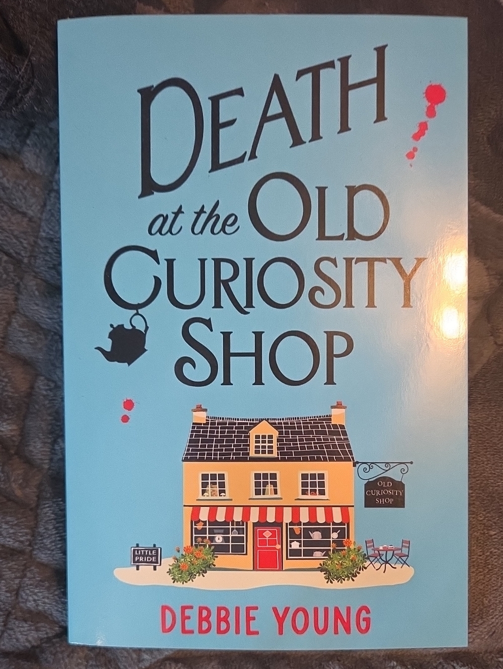 Death at the Old Curiosity Shop by Debbie Young